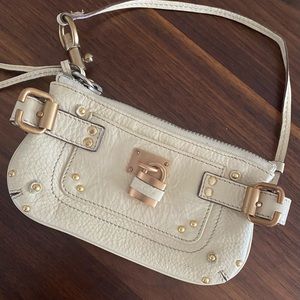 Like new, ivory Chloe Paddington Wristlet